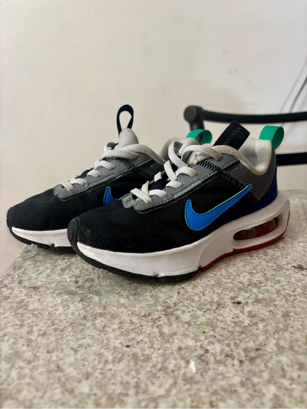 Nike Kids Black Sneakers with Blue Swoosh and Gray Accents